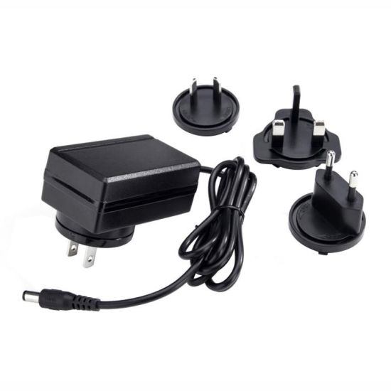 Nuevos productos Adaptador de enchufe intercambiable EU / US / UK / AU / CN Estándar 9V 2A 30W Fuente de alimentación