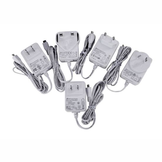 Nuevos productos Adaptador de enchufe intercambiable EU / US / UK / AU / CN Estándar 5V 1.5A 12W Fuente de alimentación
